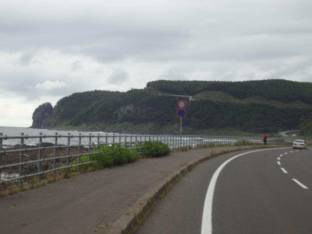 その道を自転車走る 英語